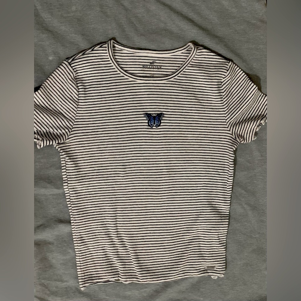 Xs Hollister black and white striped shirt with blue butterfly